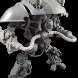 alt="power cables attached to the power pack of an imperial knight and curving out to attach to the arm weapons"