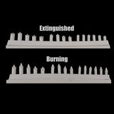 alt="example of a sprue of both burning and extinguished candles"