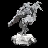 alt="tau coldstar fusion arms assembled on plastic battlesuit, pictured with foot up on concrete slab viewed from the left looking away from camera "