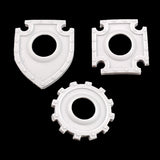 alt="one of each helverin shields, top left crest, top right crux and bottom middle cog"