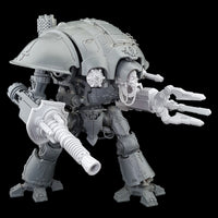 alt="imperial knight model kit with additional lightening cannon, skull head, plasma gun, shield generator and jointed claw arm shown from the right hand side"