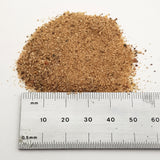 alt="Close up of smooth sand next to a ruler to give an impression of particle size"