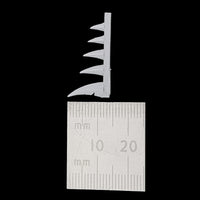 alt="scenic resin spikes shown measured next to a rulers, showing the tallest to be 12mm in height"