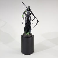 alt="painted star reaper miniature shown on a fifty millimetre round black plinth for reference" 